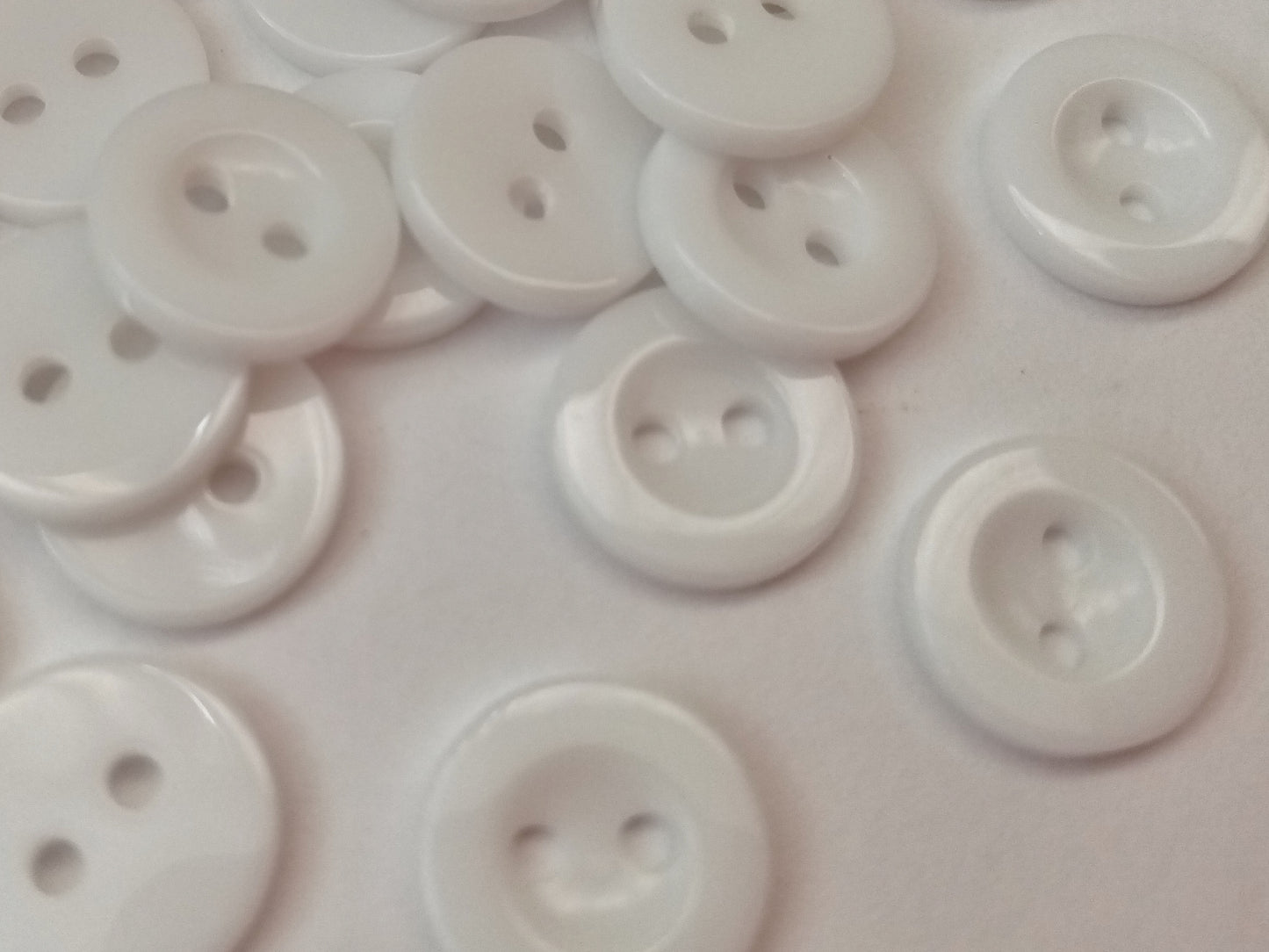 20 Small White Shirt Buttons with 2 holes measuring 12mm half an inch. Pack of 20 buttons
